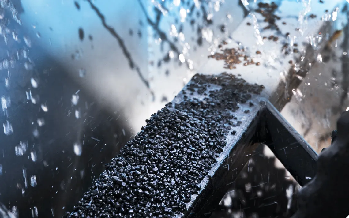 Water rinsing expanded clay granules during the filtration process.