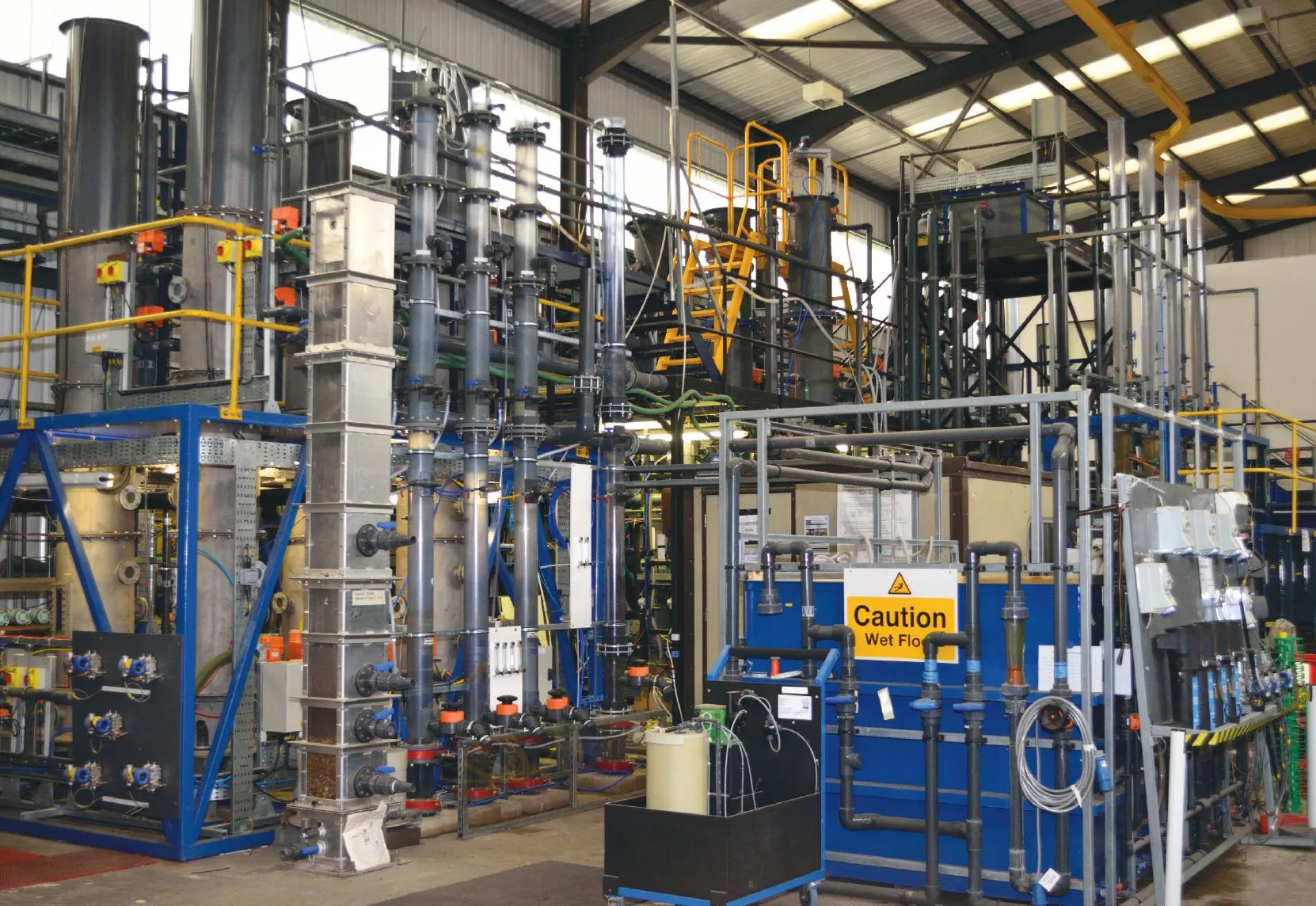 Interior of Thames Water’s research facility showcasing filtration equipment and piping systems