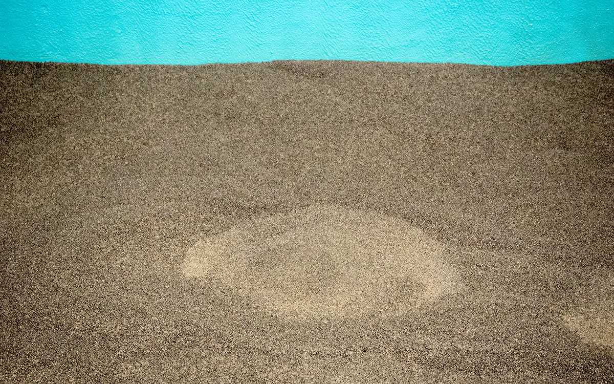 Interior of a filtration tank with a bright blue wall at VEAS, where Filtralite media supports nitrification and denitrification processes